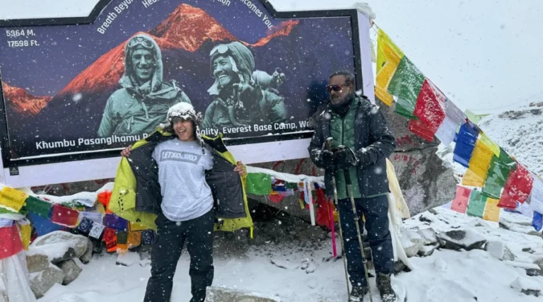 Trekkers posing at new EBC SIgnboard