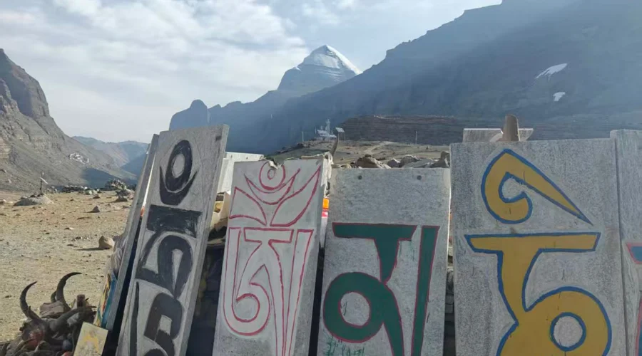 Mani walls with the background of Mount Kailash