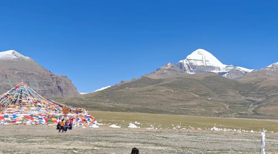 Majestic view of Mount Kailash seen along with the prayer flags