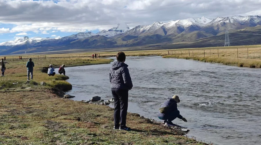 Pilgrims enjoying the view along with the river